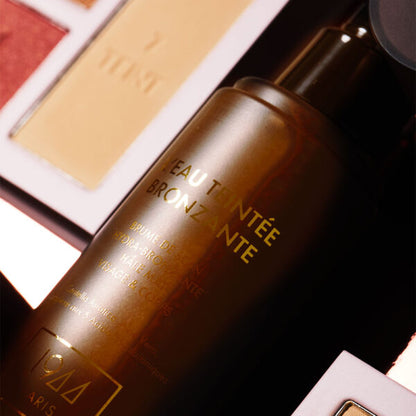 AGUA BRONCEADORA TEÑIDA -L’ EAU TEINTÉE BRONZANTE